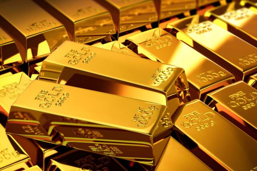 Stack of 1000g fine gold bars – gold price forecast and 50-year outlook on gold investment, AI impact and global economic scenarios