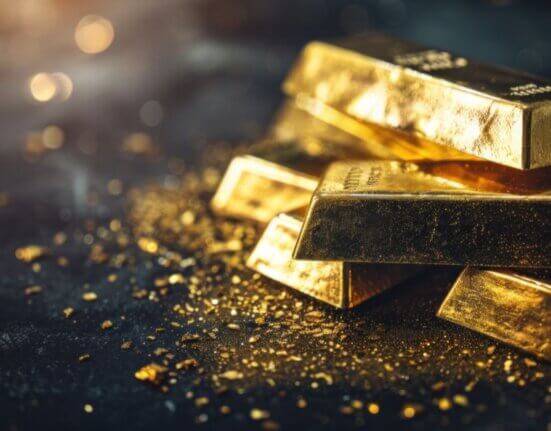 Stack of gold bars on dark background – physical gold bullion symbolizing wealth preservation, gold investment, and the timeless store of value throughout history